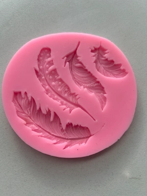 Moule plumes — image 1