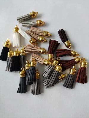 Lot de 25 pompons en suédine 38mm — image 1