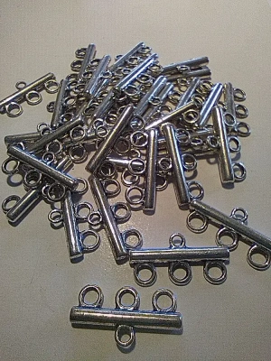 8 embouts multi-rangs en métal argenté — image 1